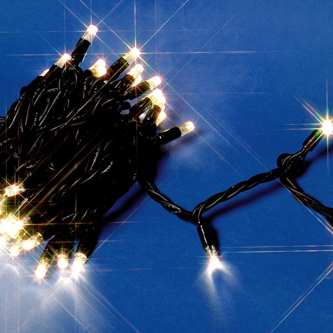 DecoWoerner Luces De Navidad>Cadena De Luces De Bajo Voltaje Negra 10m IP44 100LED Blanco Cálido