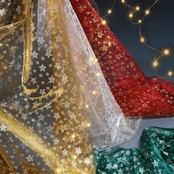 DecoWoerner Telas>Tela De Organza "Estrellitas" Dorada Anchura 145 Cm